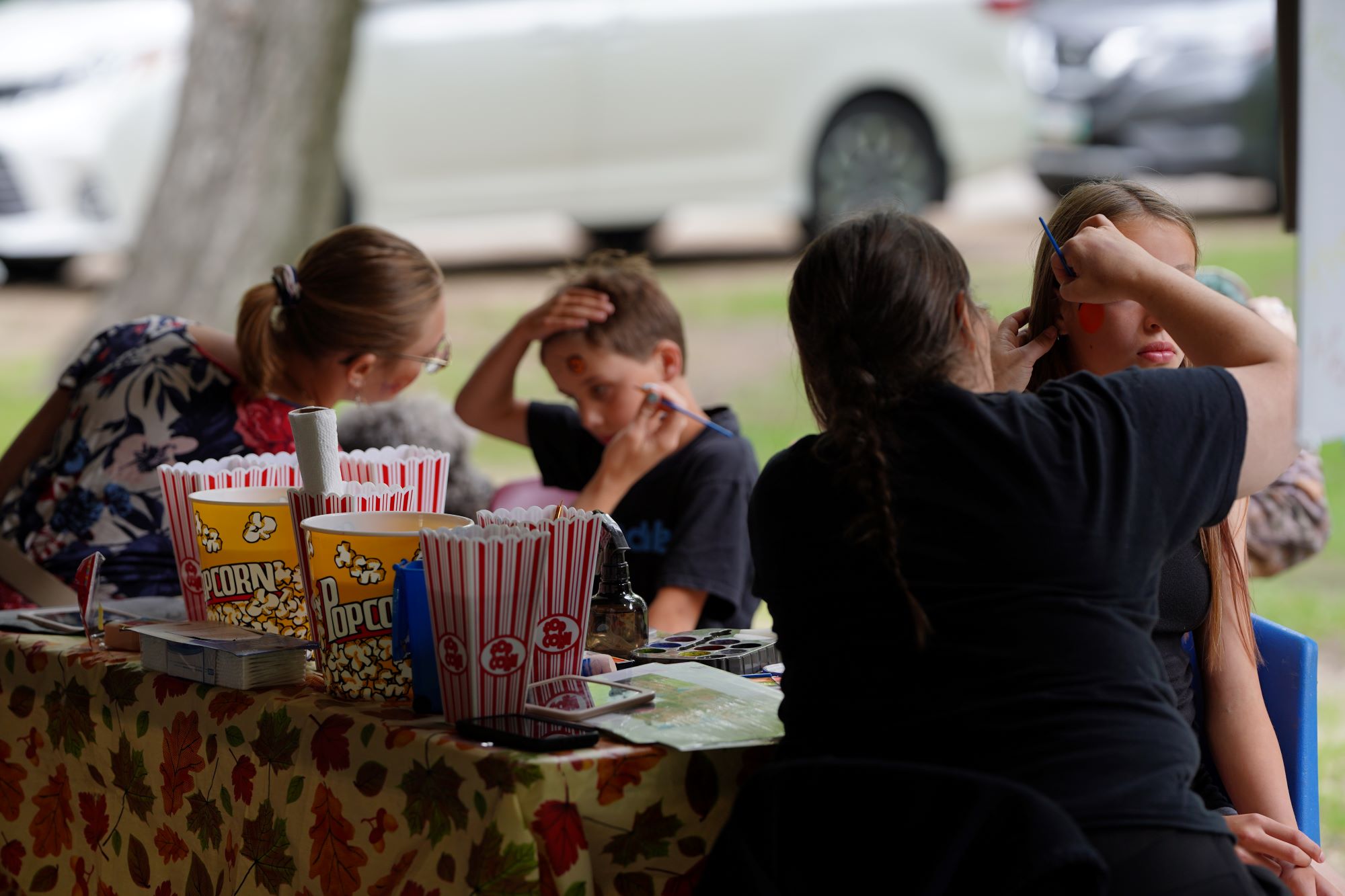 kids getting face painting