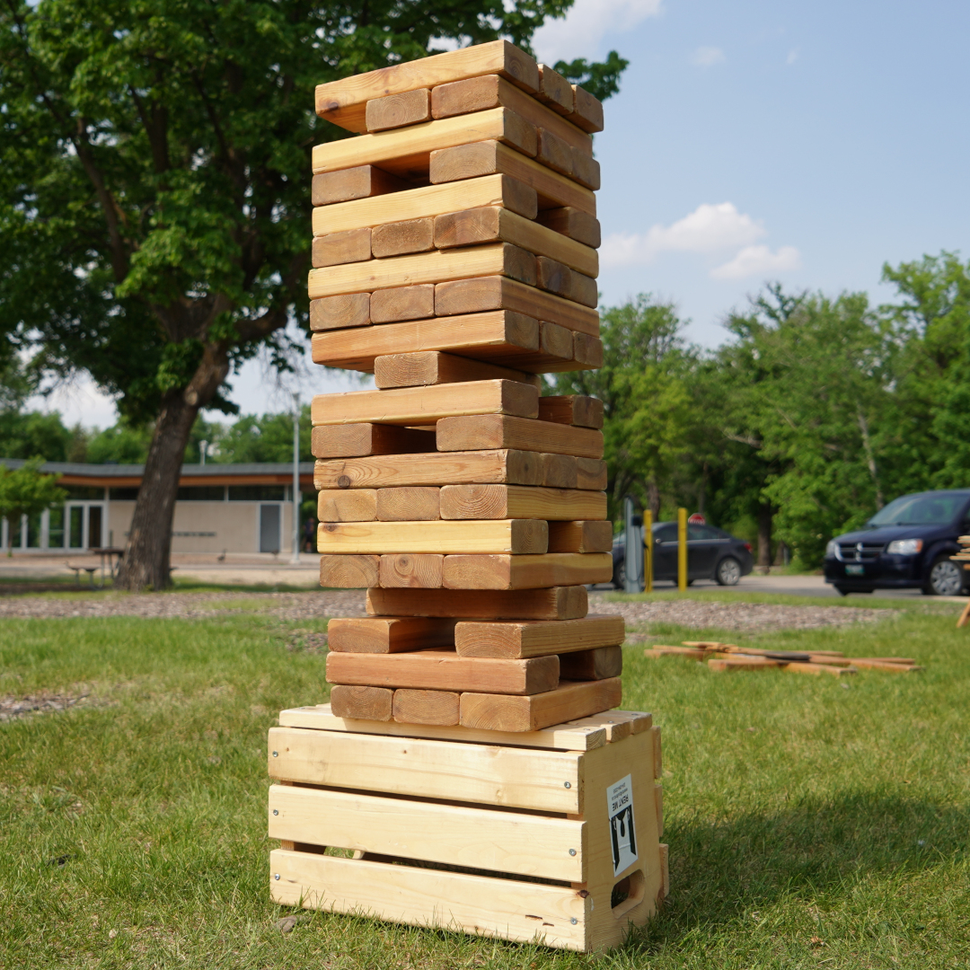 a 5ft jenga game set up outside