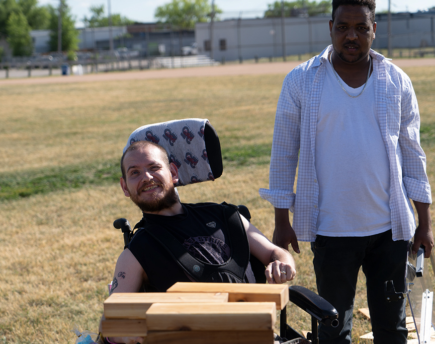 a man in a wheelchair plays a game